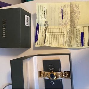 Gucci 6400 stirrup bracelet hatch Watch